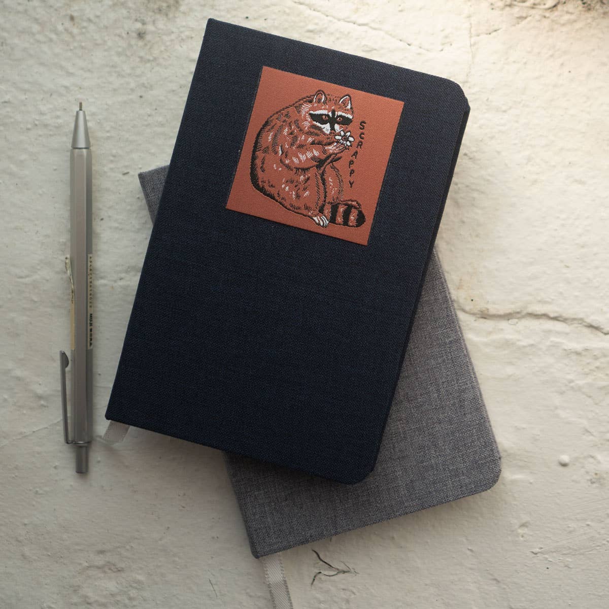 Stay Home Club - Patched Linen Notebook - Scrappy Raccoon