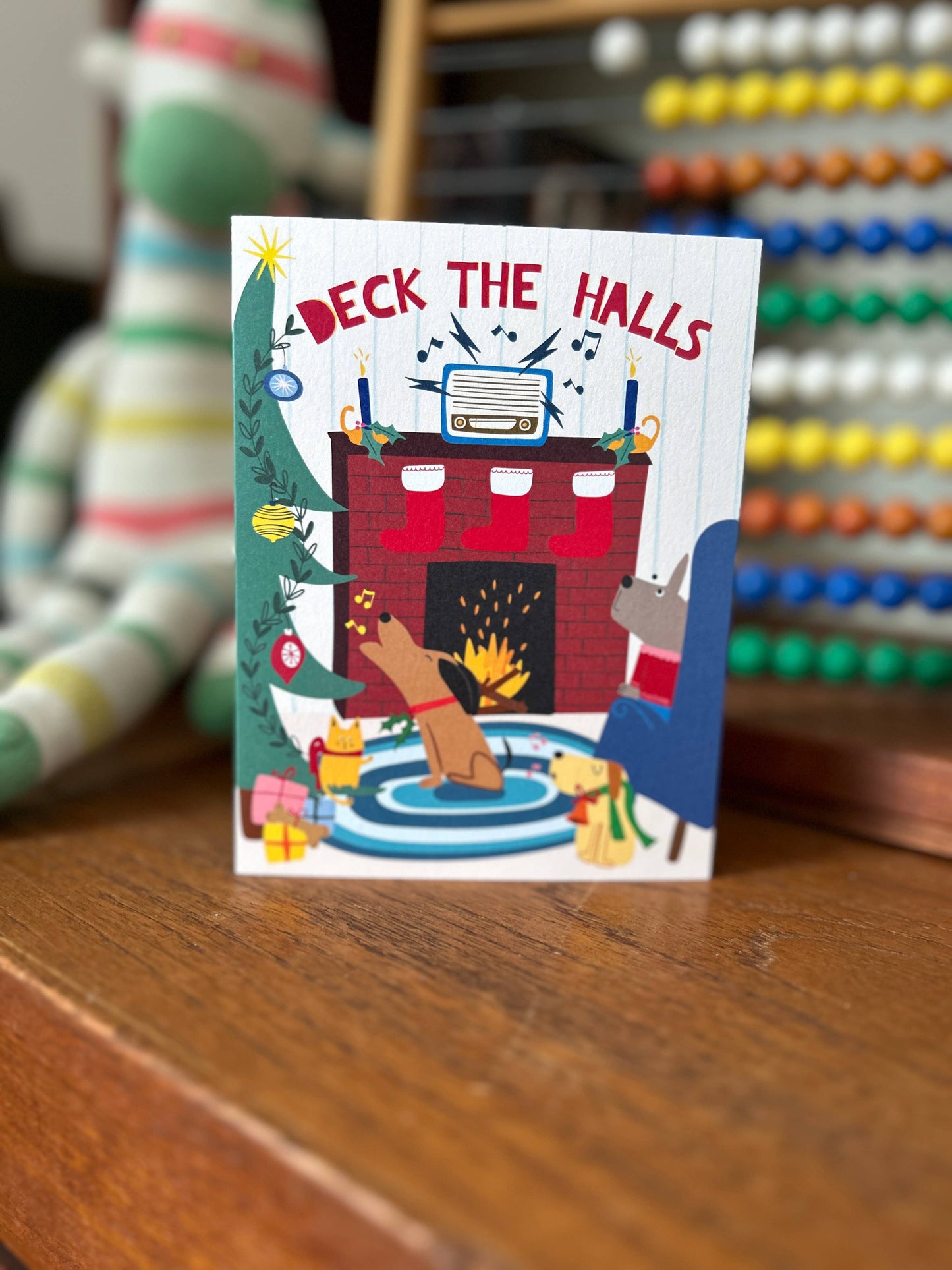 Happy Just Happy - Doggy Carolers by the Fireplace Holiday Card - Agricola Street Books
