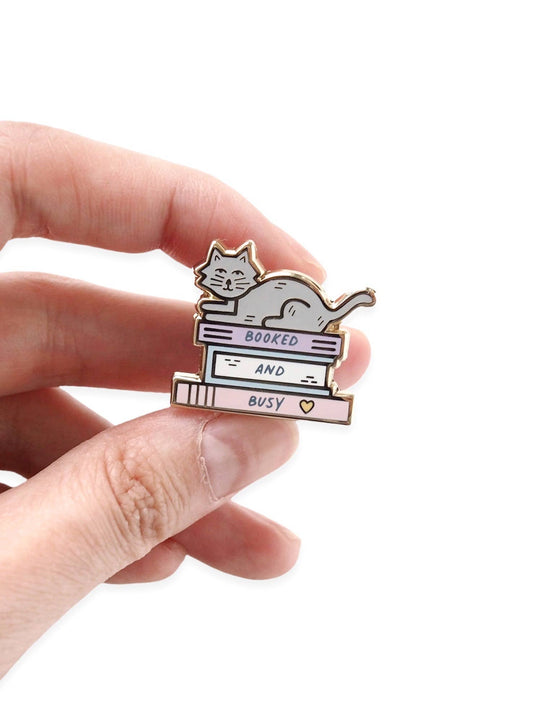 Desk of Sandra - Booked and Busy Enamel Pin - Agricola Street Books