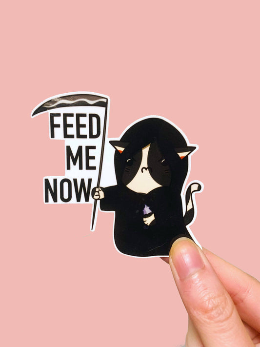 Small Noggin Studios - Feed Me Now Grim Reaper Cat Vinyl Sticker, hungry kitten